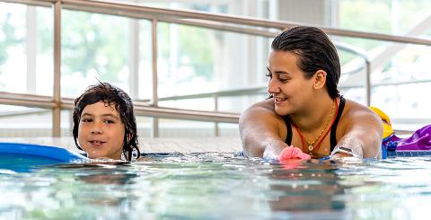 A child participates in swimming lessons at the Leisure Centre.